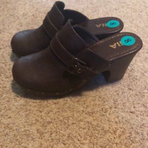 Brown clogs